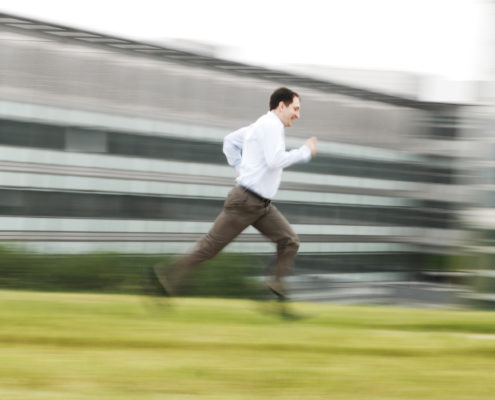 Businessfoto Manager beim Laufen