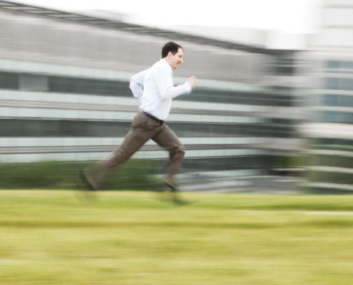 Businessfoto Manager beim Laufen